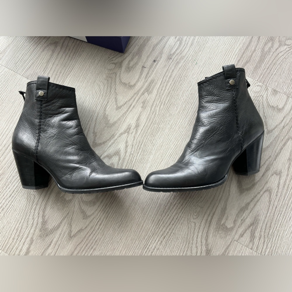 Stuart Weitzman ankle cowboy boots , black leather . Slightly worn .